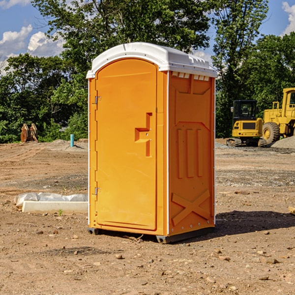 how often are the portable restrooms cleaned and serviced during a rental period in Portland